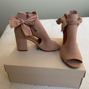 Brand new plush JUSTFAB heel boots.